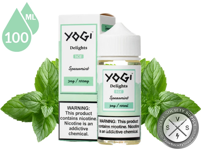 Spearmint Delights YOGI 100ml surrounded by fresh spearmint leaves.