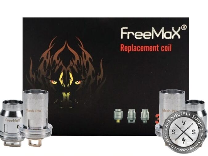 FreeMax Mesh Pro coils on each side of the black FreeMax Replacement Coil box