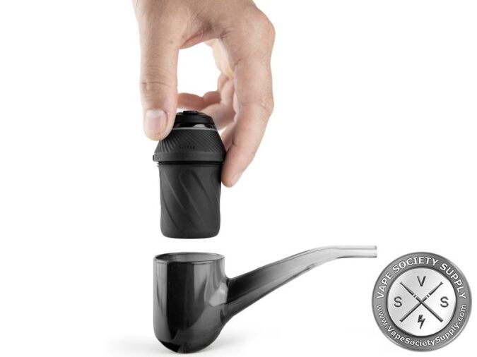 A hand fitting a black Puffco Proxy base into its glass pipe
