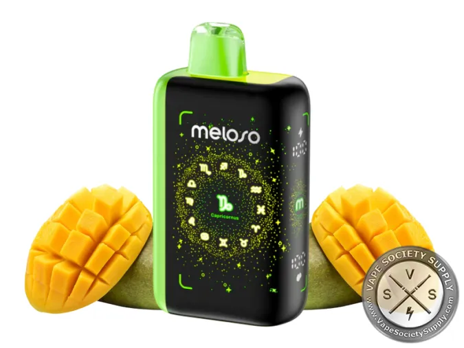 Geek Bar Meloso Bar 30K Mexico Mango disposable vape with a green top, next to mango halves
