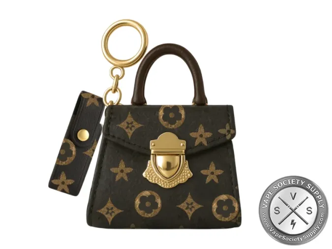 Dark brown Smyle Pursejamin bag with a floral pattern, a gold clasp and a gold keyring