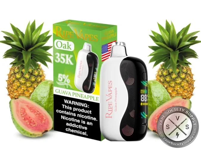 Ripe Vapes Oak 35K Guava Pineapple disposable vape in white with its green box, next to pineapples and guavas