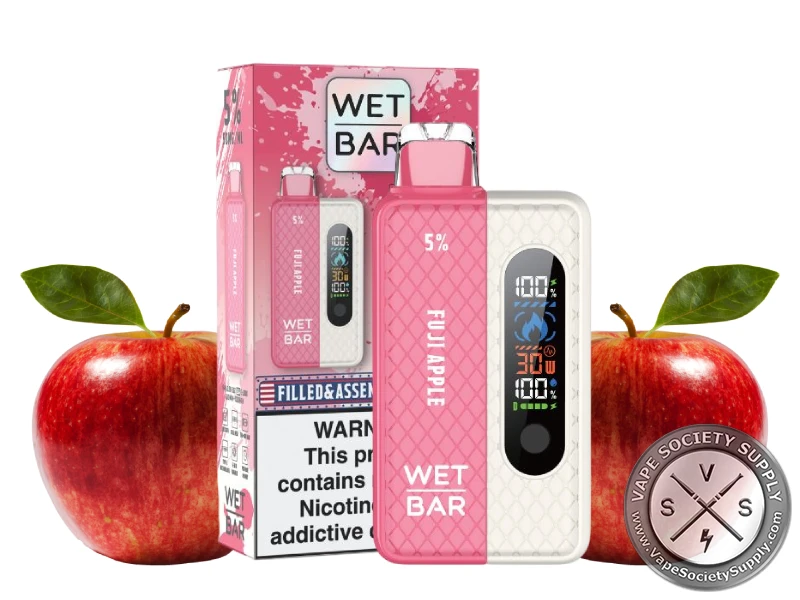 Wet Bar 35K Vape Kit Fuji Apple kit with its box, next to red apples