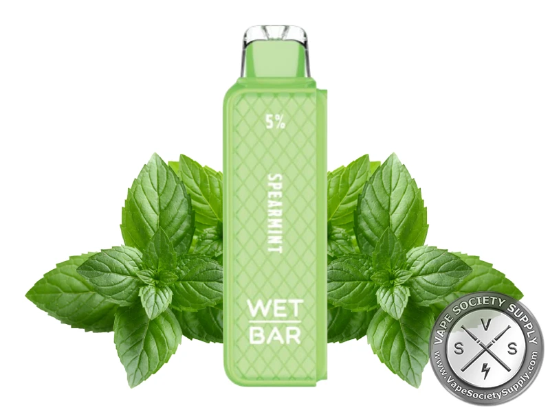 Wet Bar 35K Spearmint pod in green, next to mint leaves
