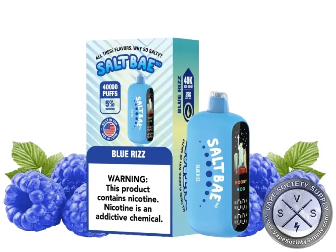 SaltBae50 Blue Rizz disposable vape in blue, with its box, next to blue raspberries