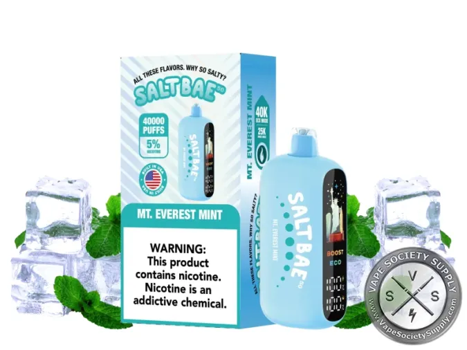SaltBae50 Mt Everest Mint disposable vape in light blue, with its box, next to ice cubes and mint leaves