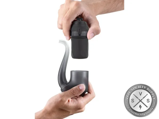 Hands fitting a black Puffco New Proxy base into its glass pipe