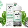 Spearmint Delights YOGI 100ml surrounded by fresh spearmint leaves.
