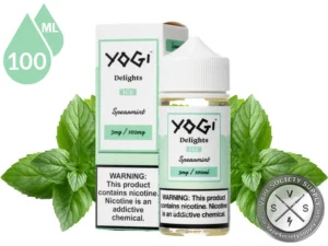 Spearmint Delights YOGI 100ml surrounded by fresh spearmint leaves.